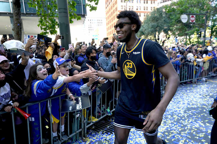 Jun 20, 2022; San Francisco, CA, USA; Golden State Warriors center James Wiseman (33) meets with fans during the Warriors championship parade in downtown San Francisco. Mandatory Credit: Cary Edmondson-USA TODAY Sports